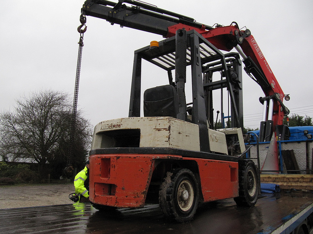 Used forklift in the rain