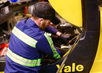 Person servicing a Yale forklift