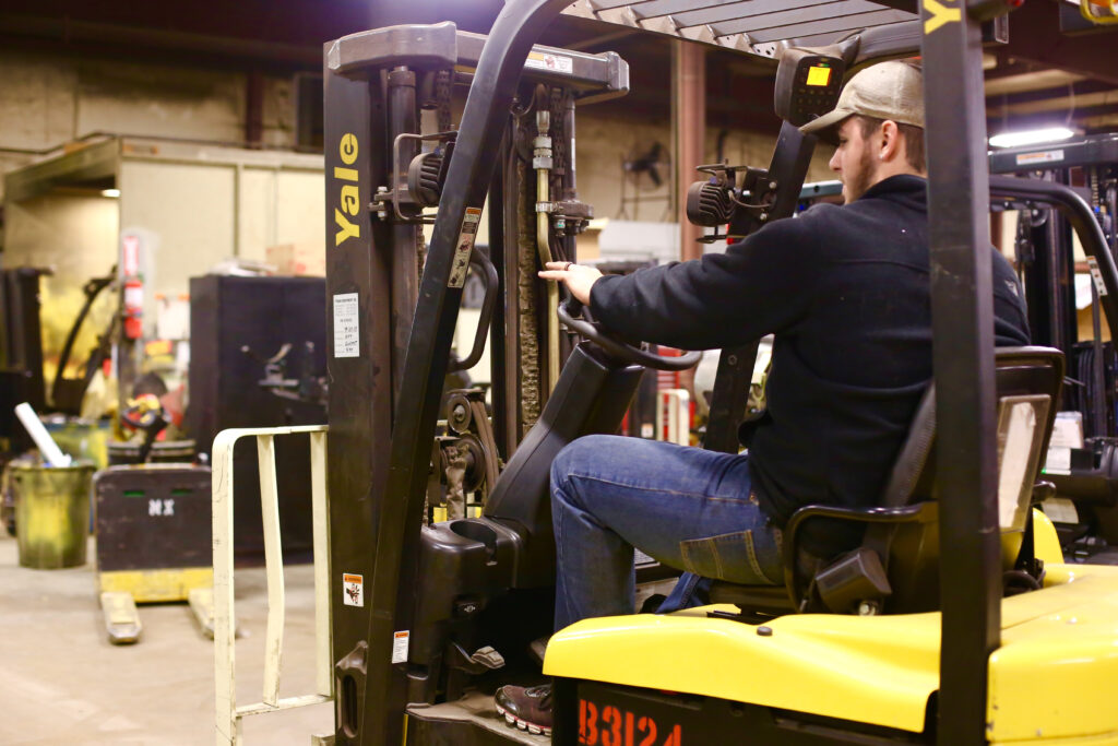 Person operating a Yale forklift